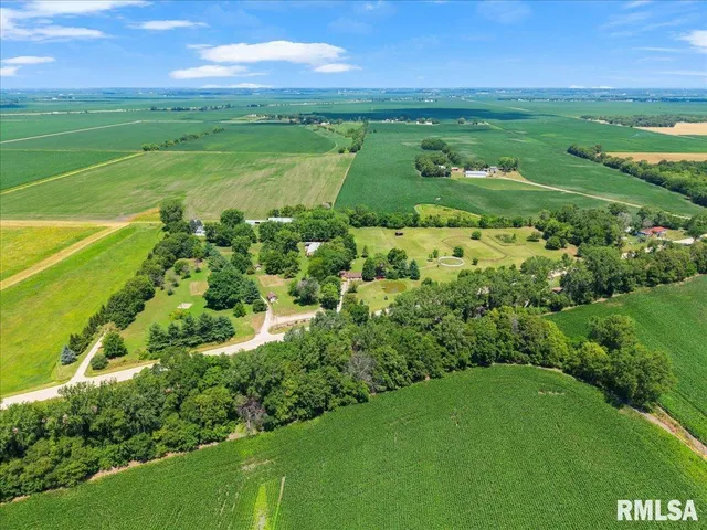 a view of a field with an outdoor space