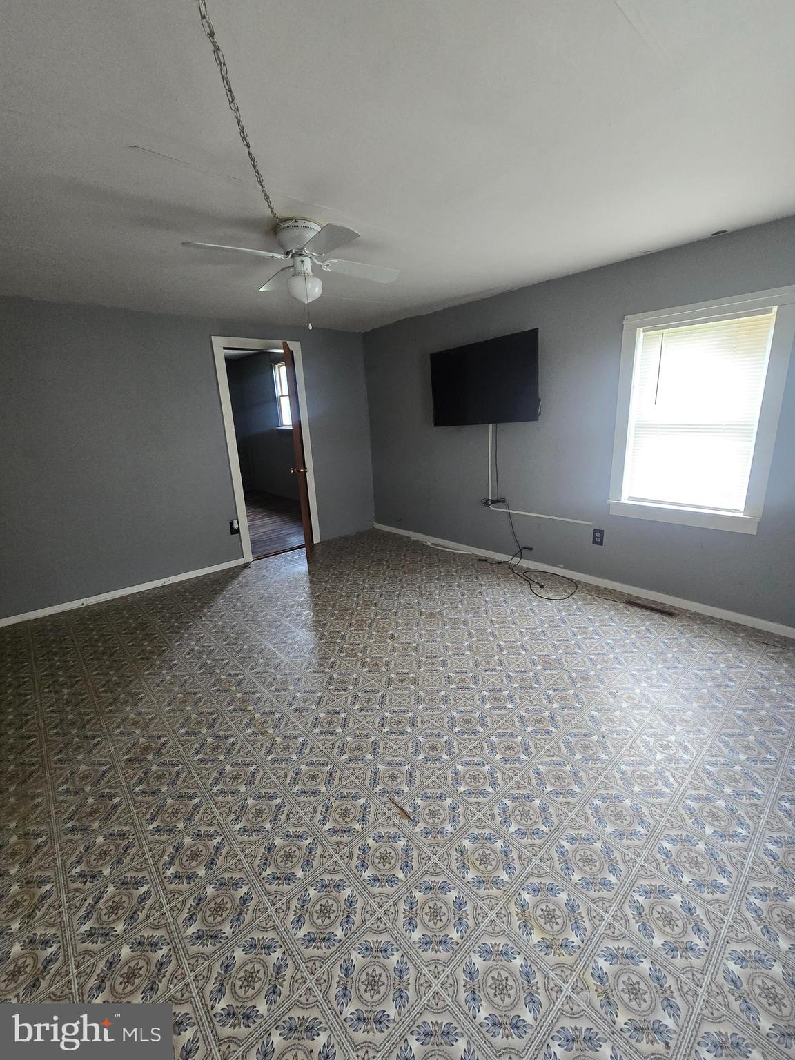 96 Main Street Heislerville, NJ 08324 - Photo 5 of 14 an empty room with windows and fan
