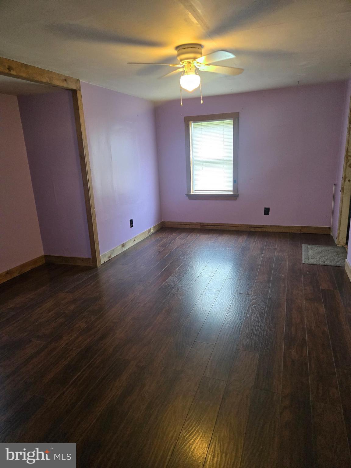 96 Main Street Heislerville, NJ 08324 - Photo 8 of 14 a view of a livingroom with wooden floor and window