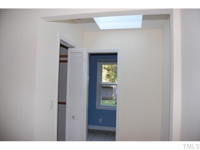 3317 Octavia Street Raleigh, NC 27606 - Photo 11 of 25 Sleep well in the master suite that offers a walk-in closet and a skylight.
