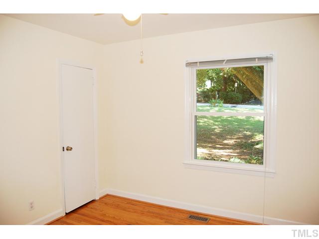 3317 Octavia Street Raleigh, NC 27606 - Photo 13 of 25 The two secondary bedrooms are each a nice size with good closet space.