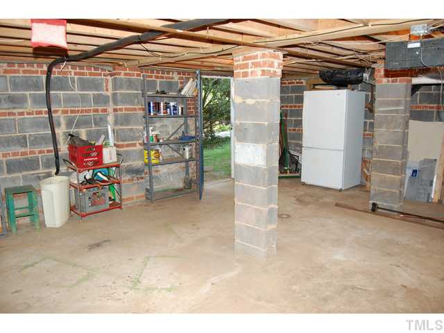 3317 Octavia Street Raleigh, NC 27606 - Photo 22 of 25 There is also a large walk-in crawl/basement area perfect for storage.