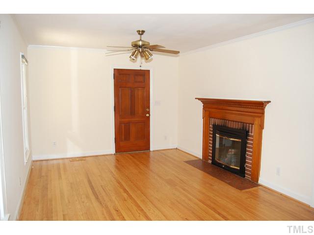 3317 Octavia Street Raleigh, NC 27606 - Photo 4 of 25 There is also a brick hearth fireplace to keep you warm on those chilly days.