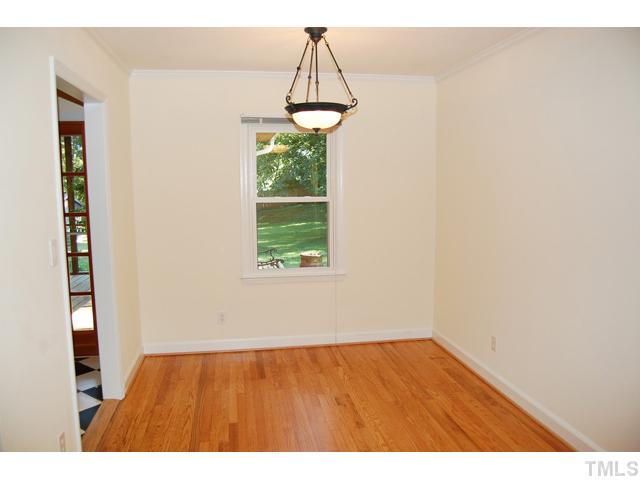 3317 Octavia Street Raleigh, NC 27606 - Photo 5 of 25 The dining room features updated fixture.