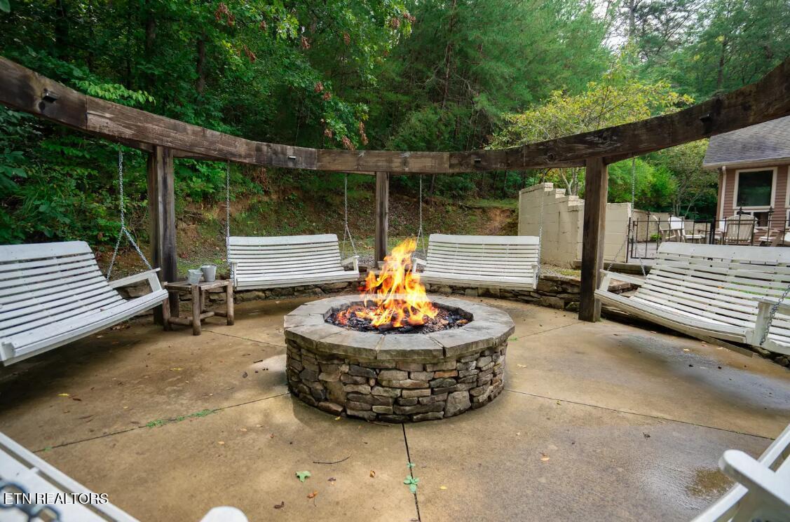 665 Gists Creek Road Sevierville, TN 37876 - Photo 4 of 53 outdoor_fireplace_seating_area