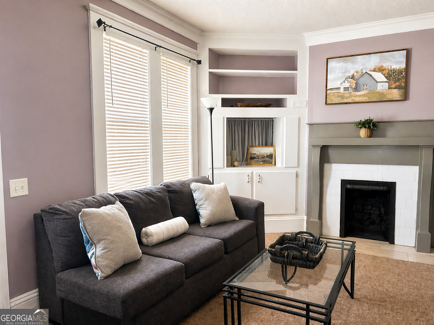 517 North Masonic Street Millen, GA 30442 - Photo 11 of 40 a living room with furniture and a fireplace