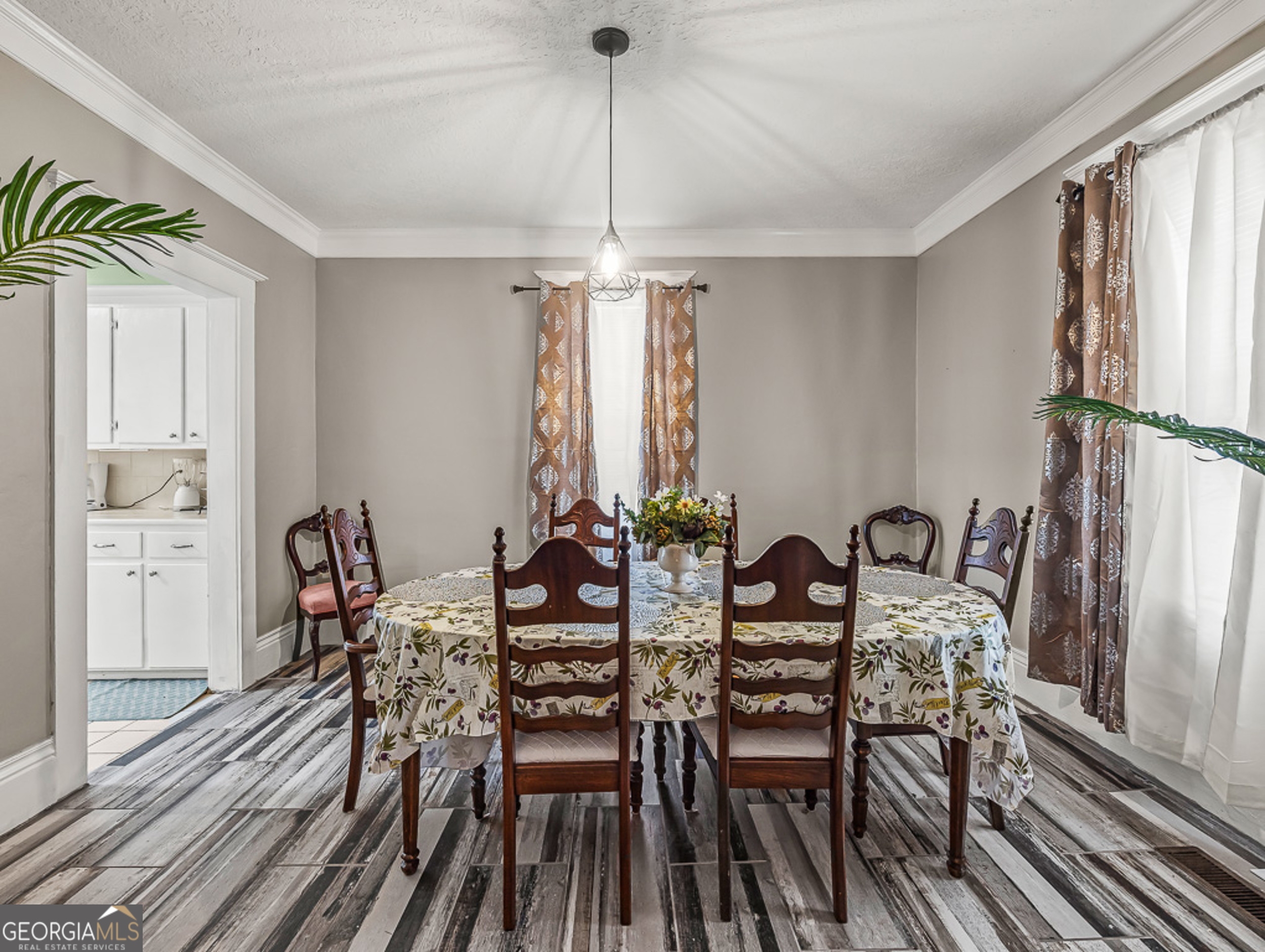 517 North Masonic Street Millen, GA 30442 - Photo 20 of 40 a view of a dining room with furniture window and outside view