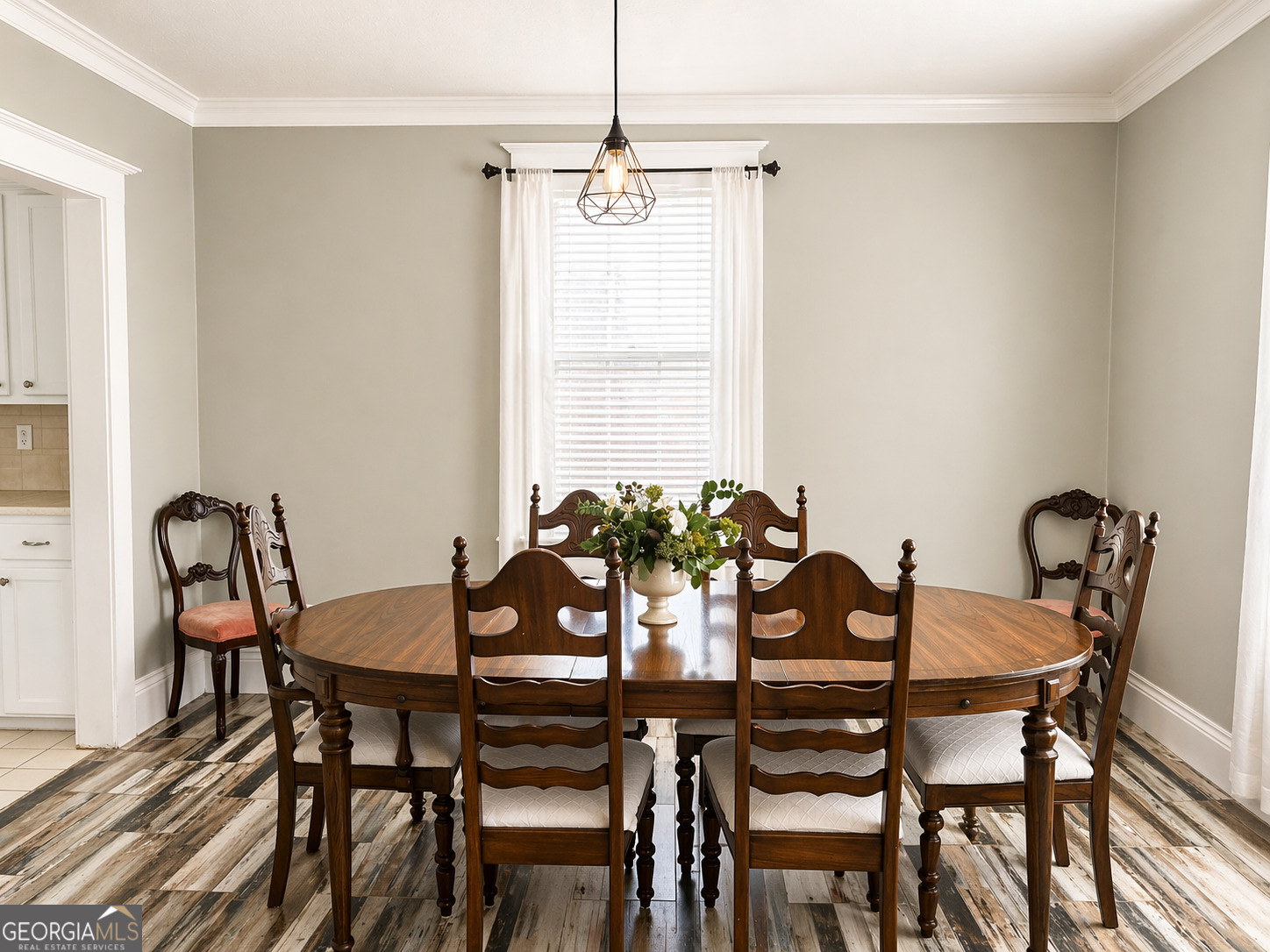 517 North Masonic Street Millen, GA 30442 - Photo 23 of 40 a view of a dining room with furniture and window