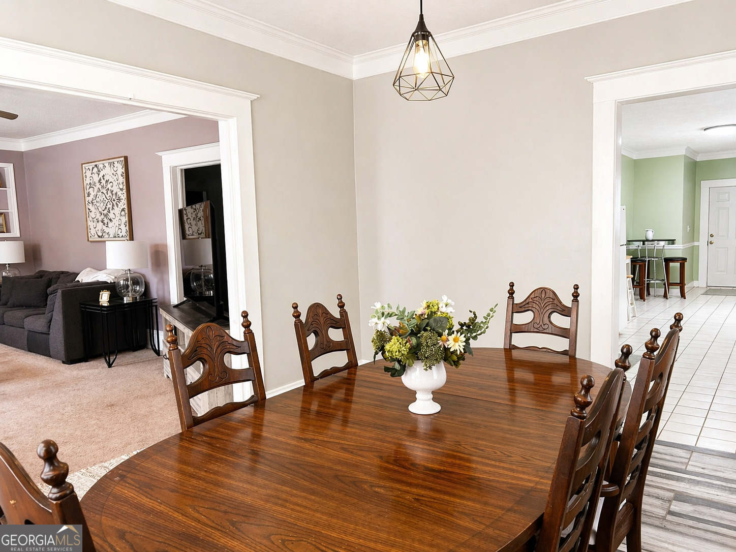517 North Masonic Street Millen, GA 30442 - Photo 24 of 40 a view of a dining room with furniture and wooden floor