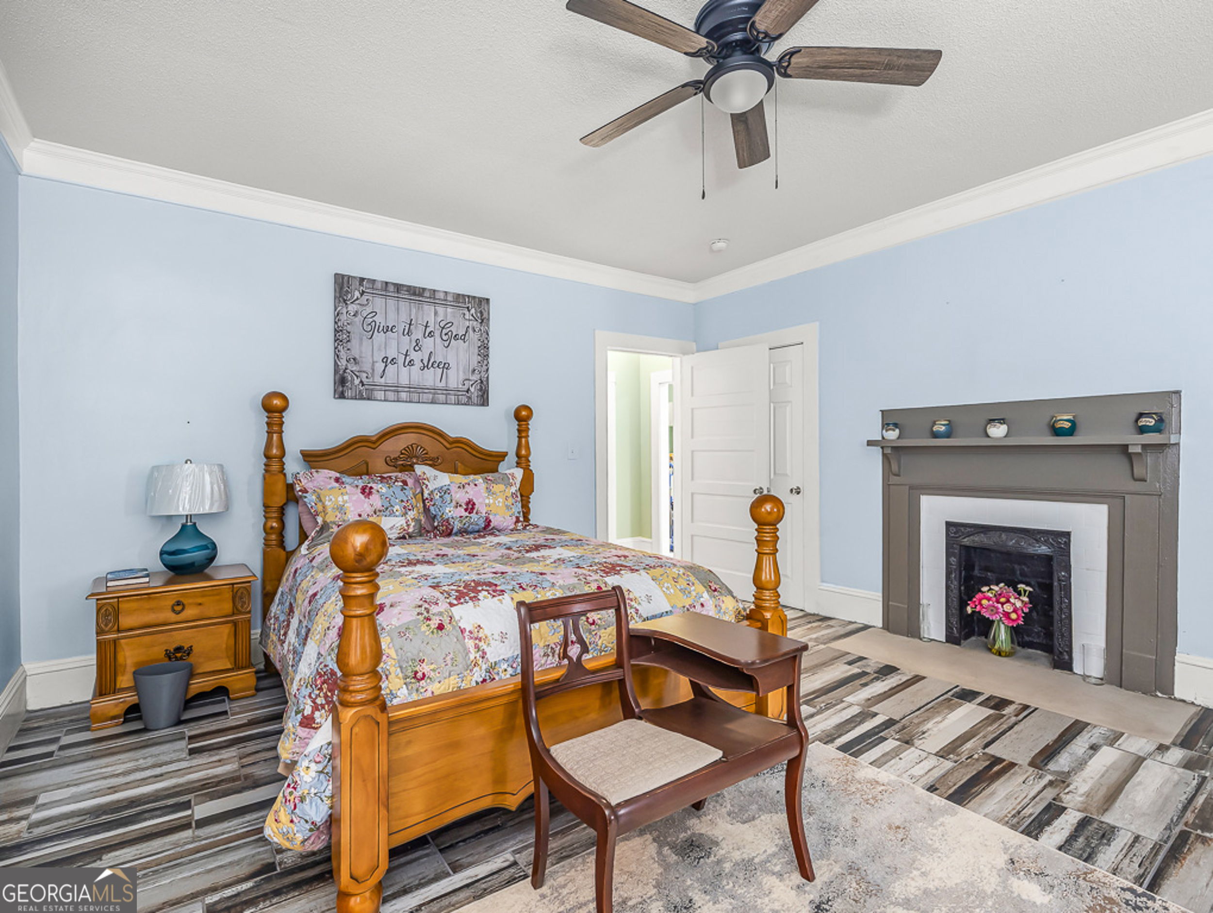 517 North Masonic Street Millen, GA 30442 - Photo 32 of 40 a living room with furniture and a fireplace