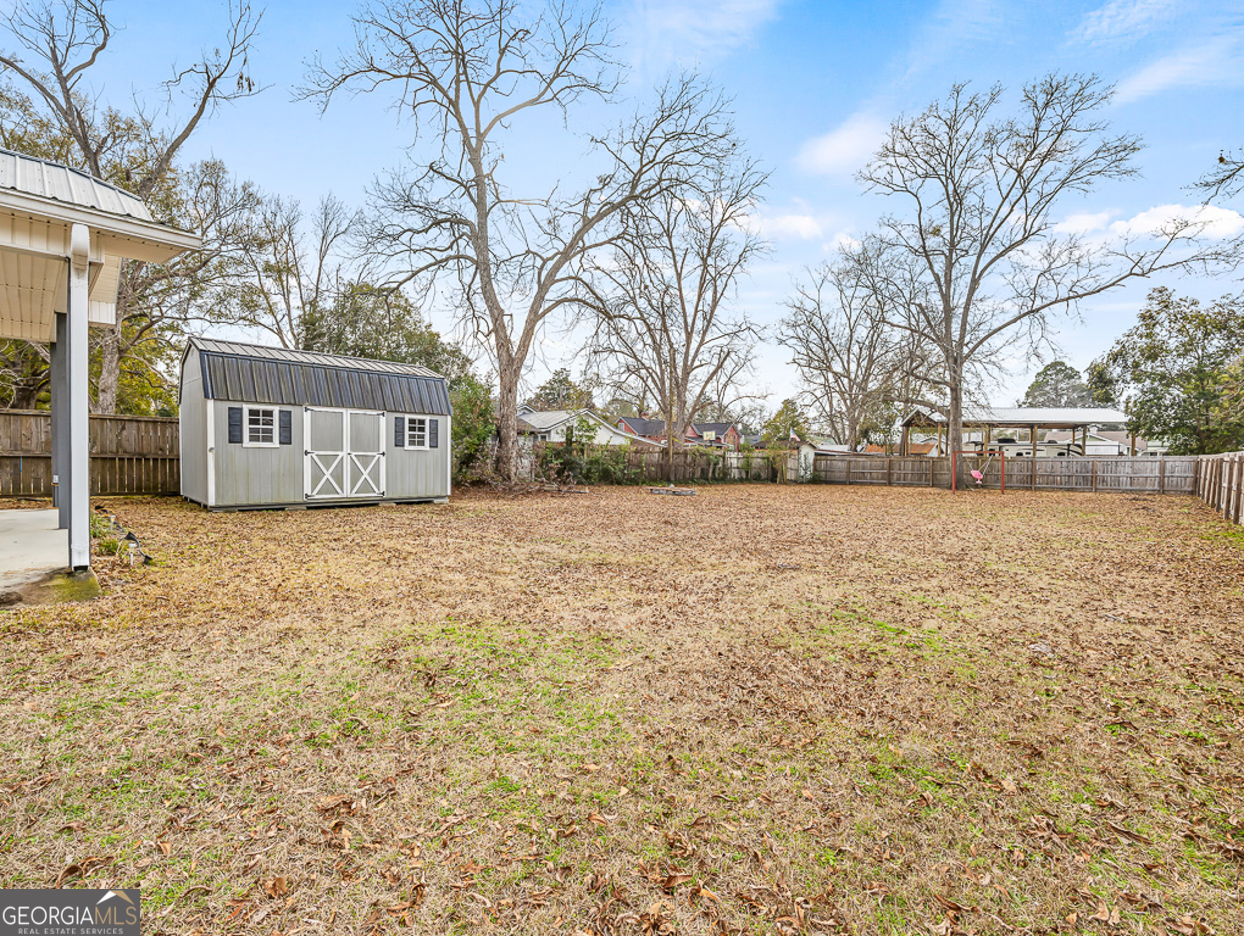 517 North Masonic Street Millen, GA 30442 - Photo 39 of 40 a view of backyard with white house