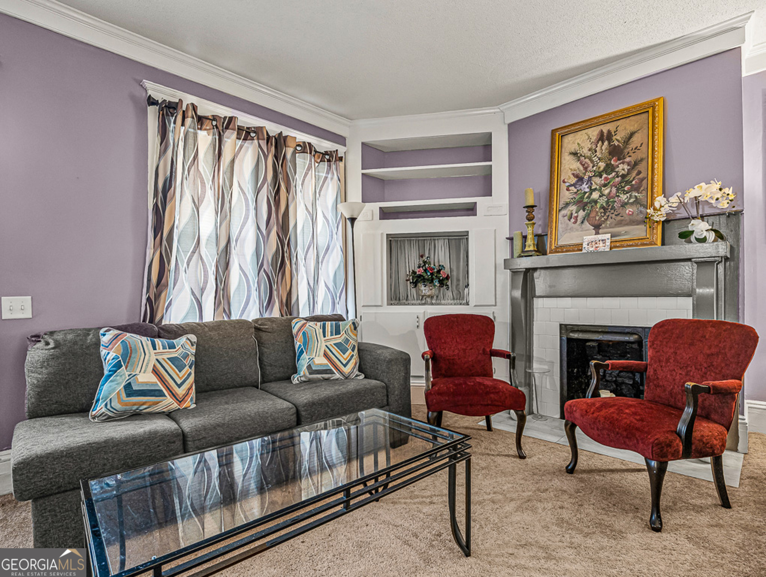 517 North Masonic Street Millen, GA 30442 - Photo 4 of 40 a living room with furniture and a fireplace