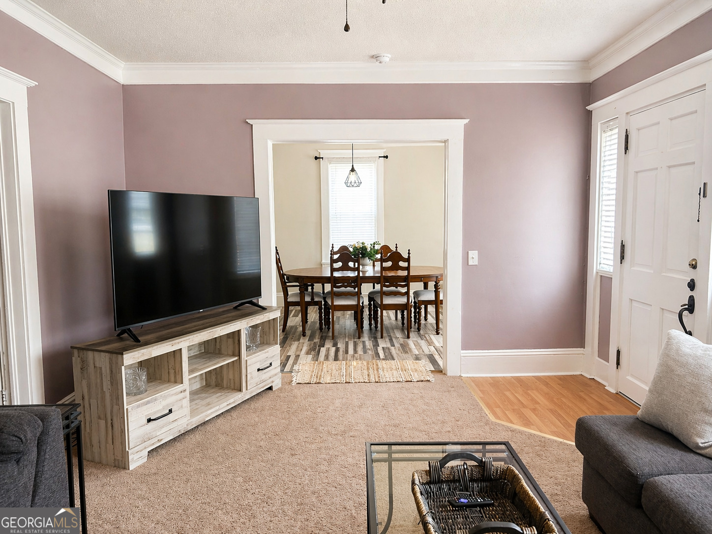 517 North Masonic Street Millen, GA 30442 - Photo 5 of 40 a living room with furniture and a flat screen tv