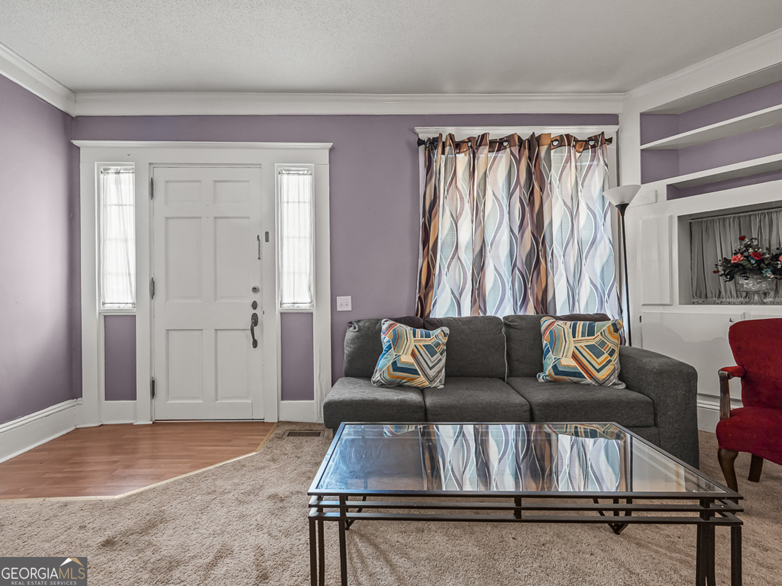517 North Masonic Street Millen, GA 30442 - Photo 6 of 40 a living room with furniture and a window