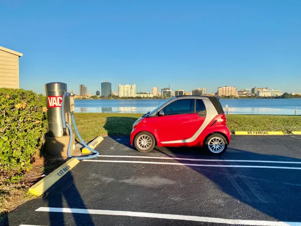 a car parked in front of a house