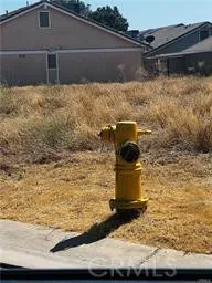 a house view with a wooden bridge