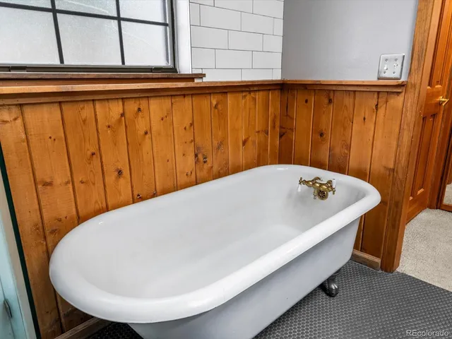 a view of a bathtub in a bathroom