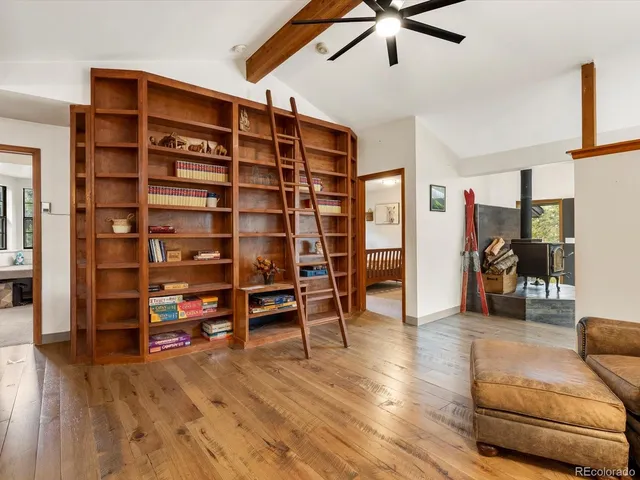 a view of livingroom with furniture and wooden floor