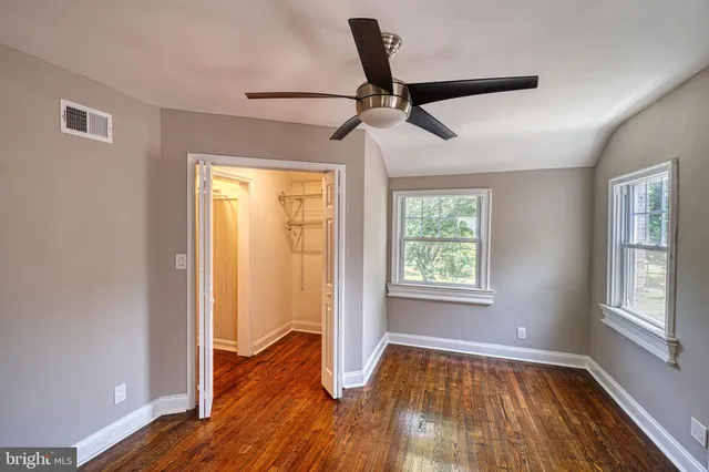 a bathroom with a sink a toilet and tub
