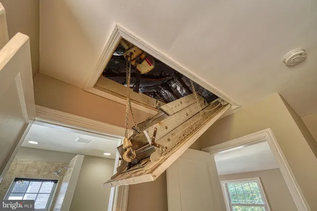 a spacious bathroom with a sink a toilet and a bathtub