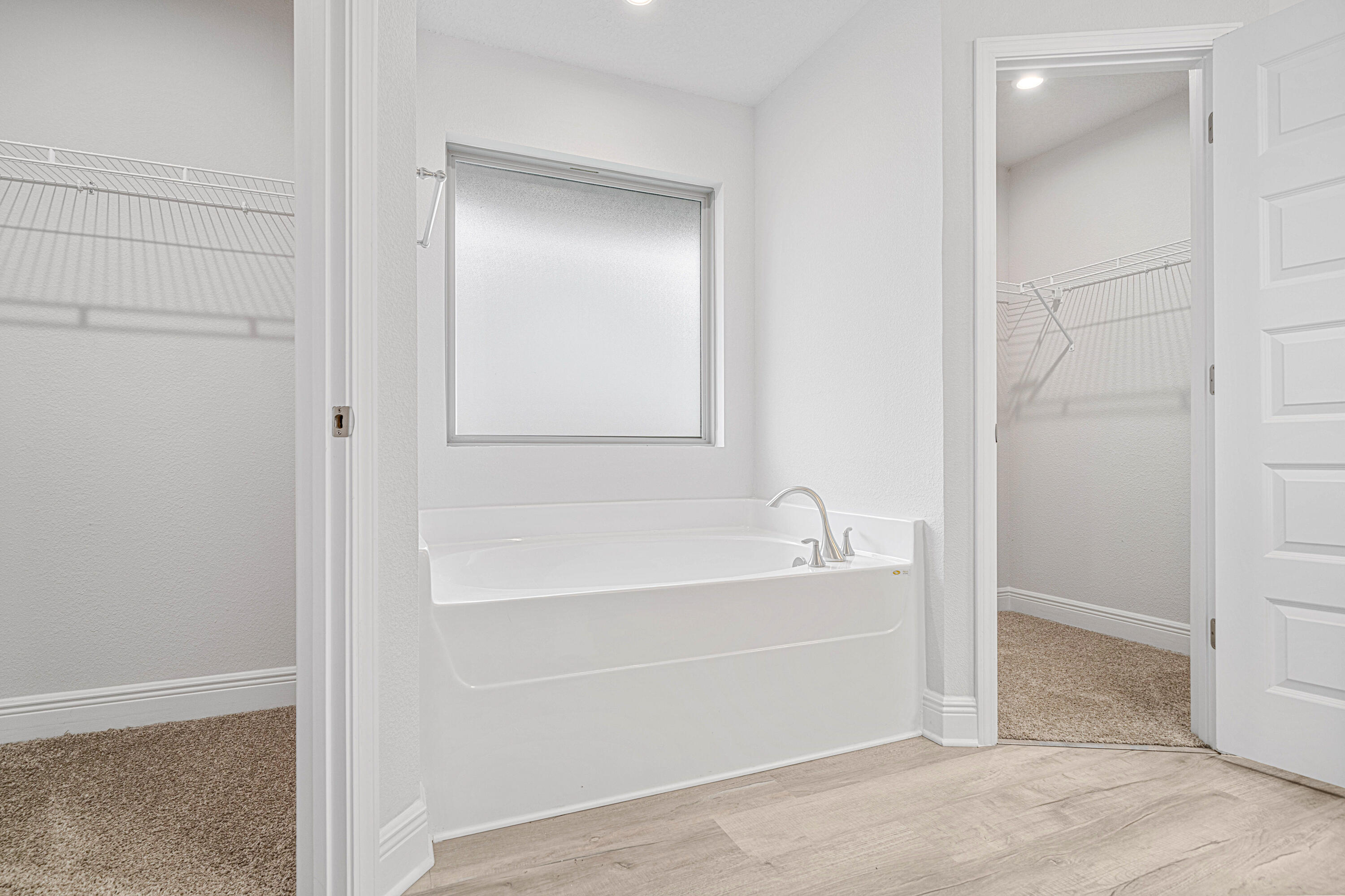 2004 Broad Street Crestview, FL 32536 - Photo 29 of 46 a bathroom with a bathtub and a shower