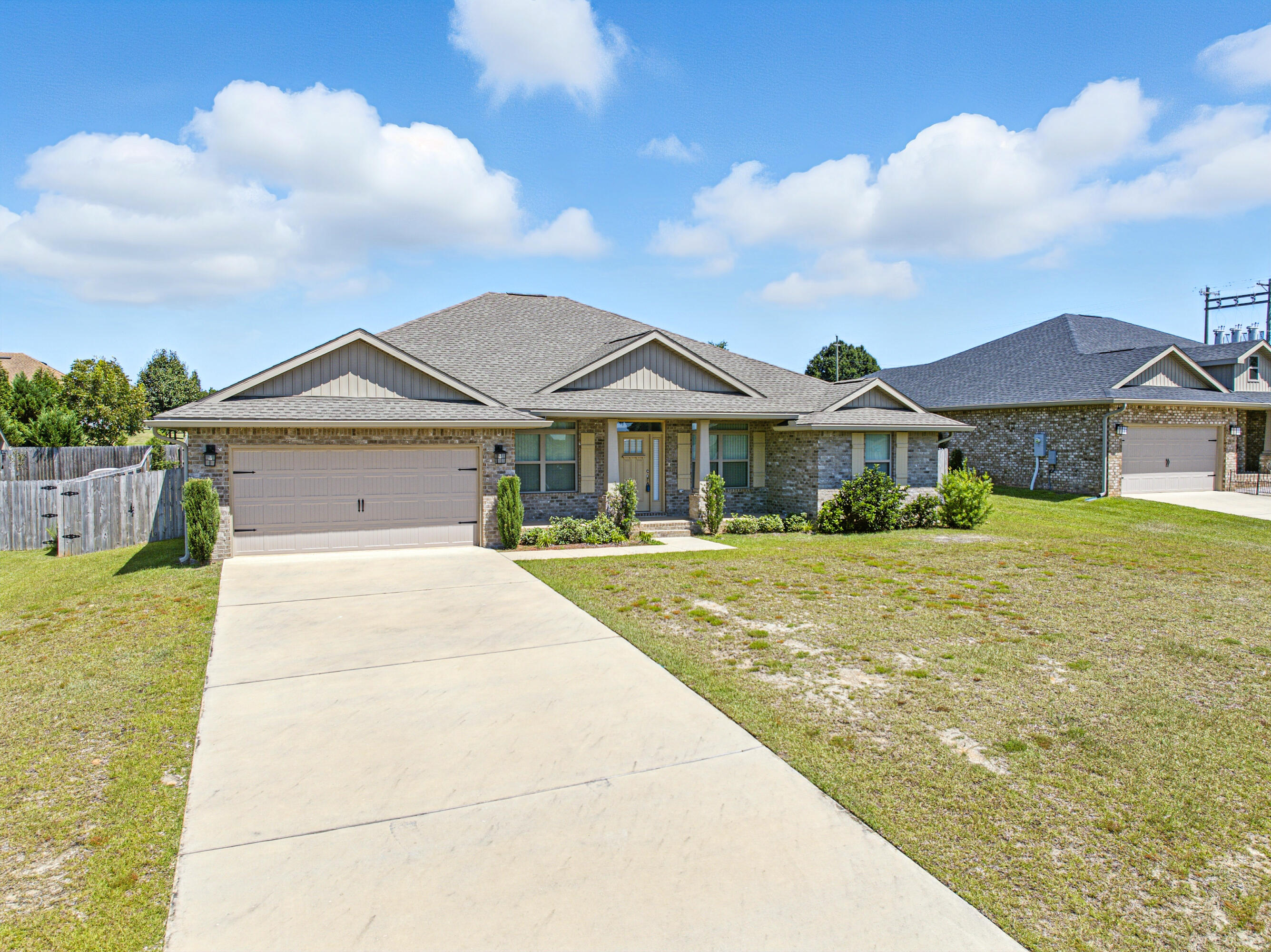 2004 Broad Street Crestview, FL 32536 - Photo 3 of 46 a front view of a house with garden