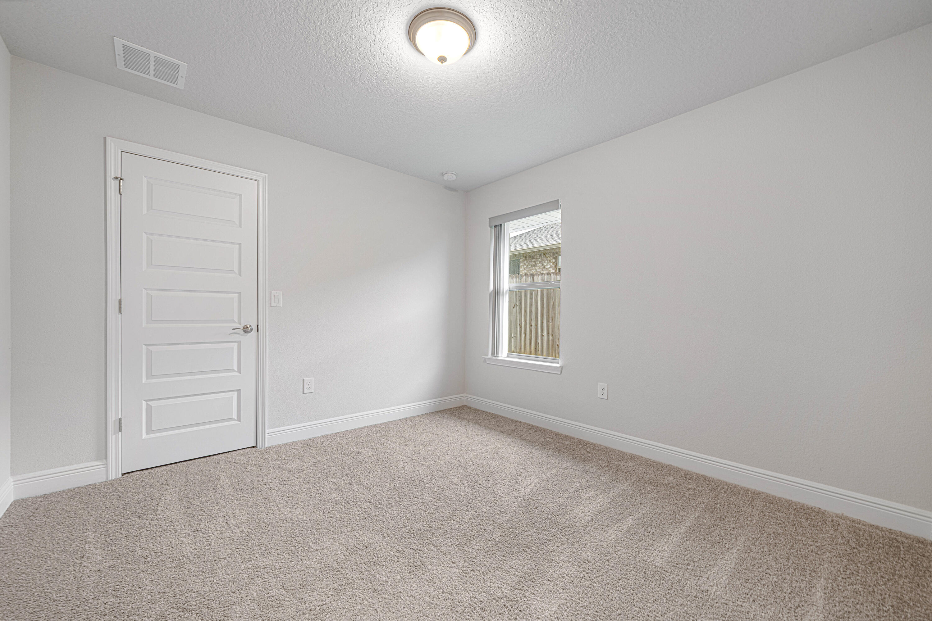 2004 Broad Street Crestview, FL 32536 - Photo 31 of 46 an empty room with windows