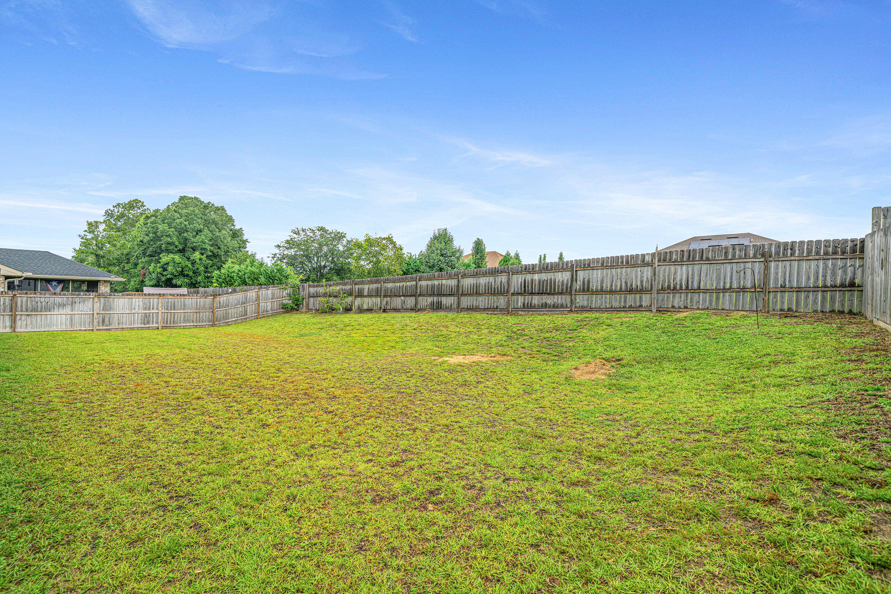 2004 Broad Street Crestview, FL 32536 - Photo 44 of 46 a view of a swimming pool and a yard