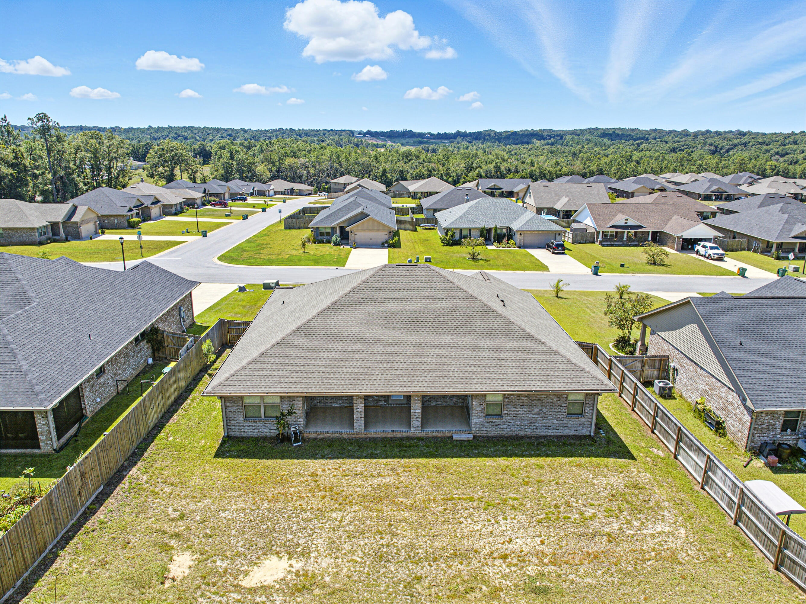 2004 Broad Street Crestview, FL 32536 - Photo 45 of 46 a view of a swimming pool with seating area and mountains in the background