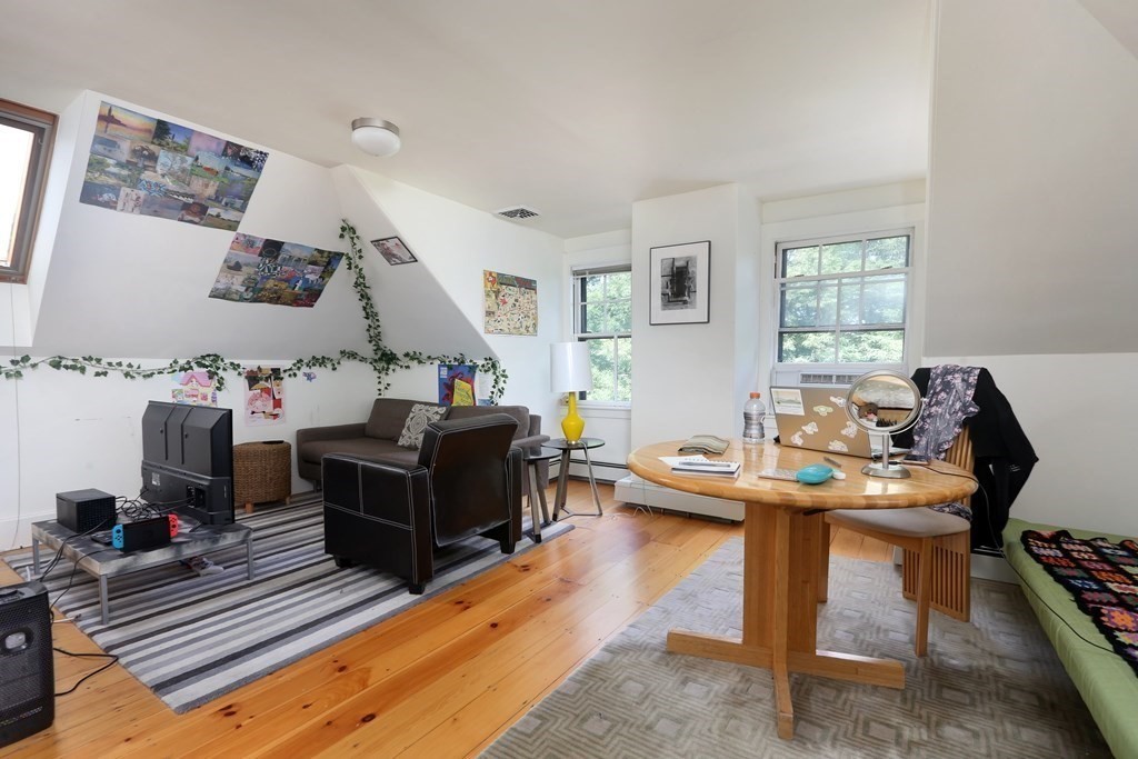 33 Thorndike Street Brookline, MA 02446 - Photo 11 of 13 a living room with furniture
