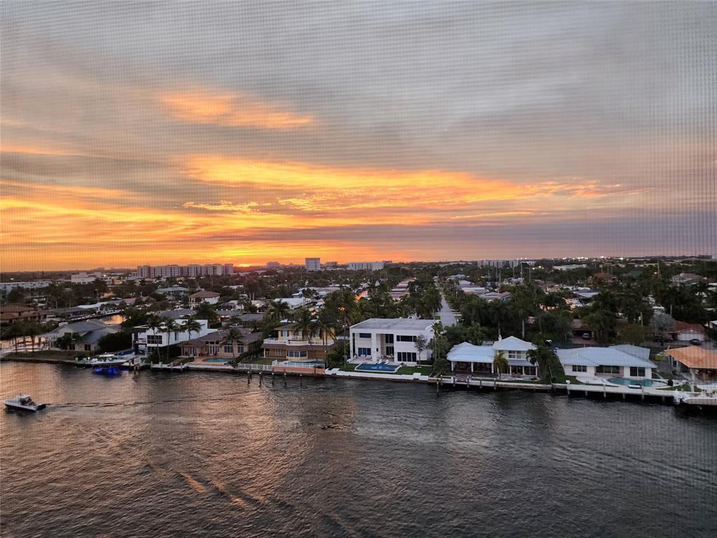 299 North Riverside Drive, Unit 303 Pompano Beach, FL 33062 - Photo 19 of 40 a view of a lake and city