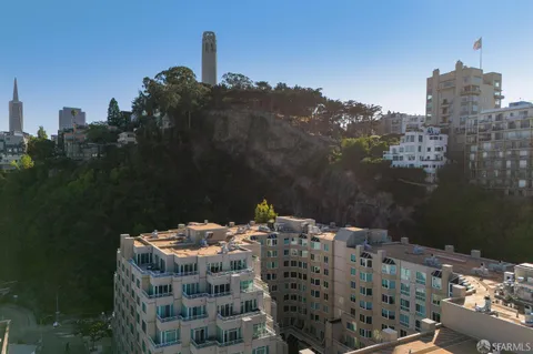 a view of a city with an ocean view