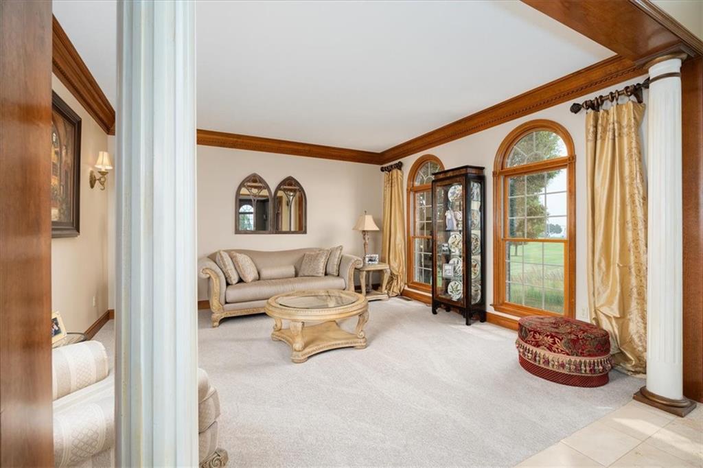 225 Church Road Fombell, PA 16123 - Photo 11 of 45 a living room with furniture and a large window