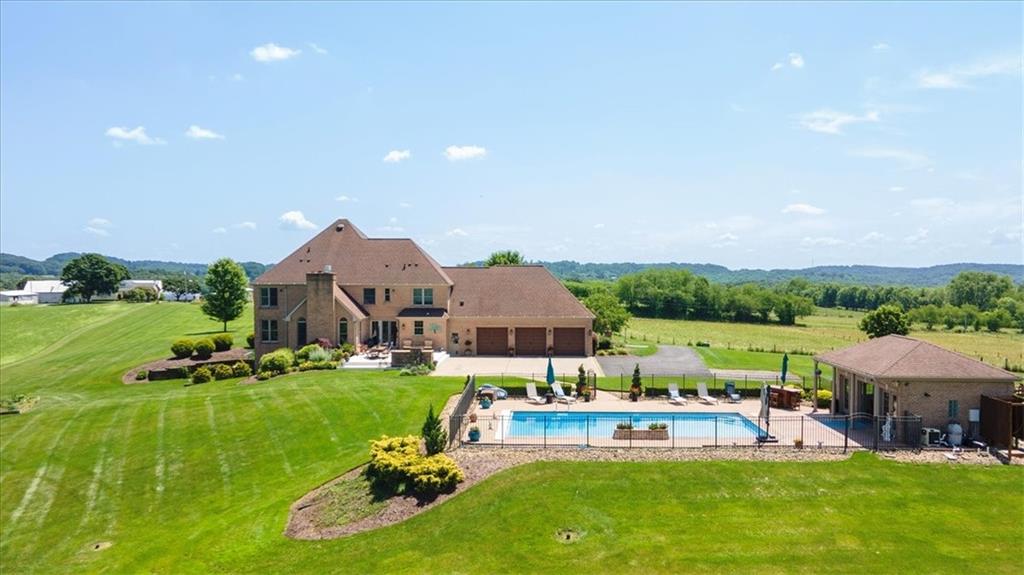 225 Church Road Fombell, PA 16123 - Photo 3 of 45 a view of a house with a yard and patio