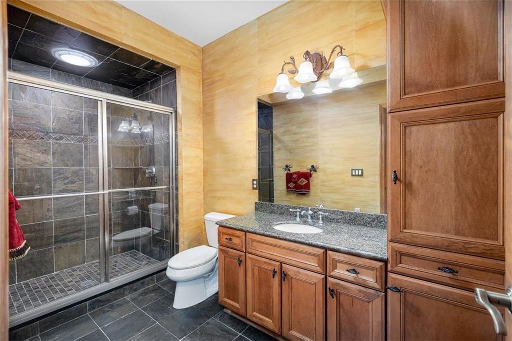 225 Church Road Fombell, PA 16123 - Photo 40 of 45 a bathroom with a granite countertop sink toilet and shower