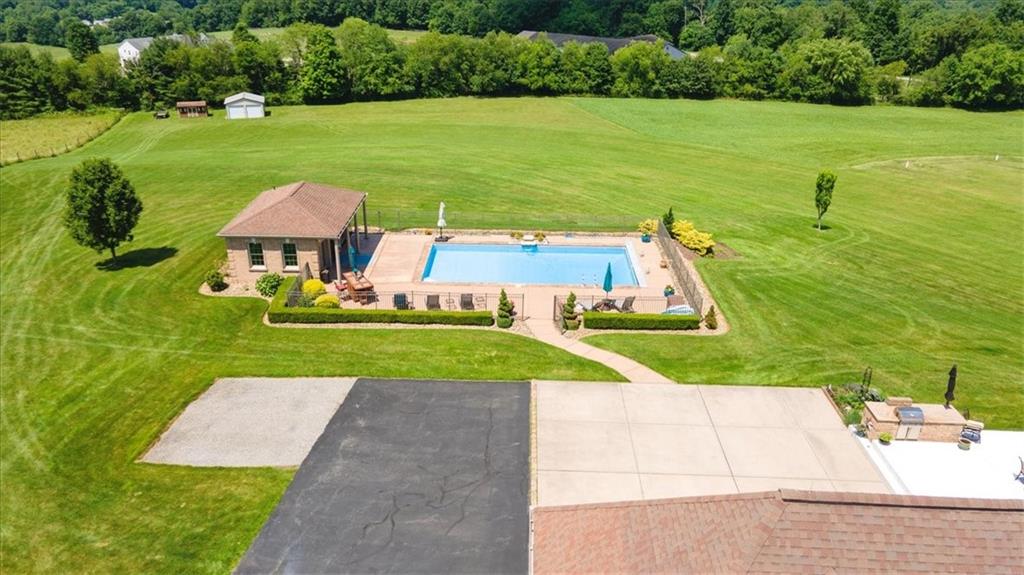 225 Church Road Fombell, PA 16123 - Photo 42 of 45 an aerial view of a house with a yard and lake view