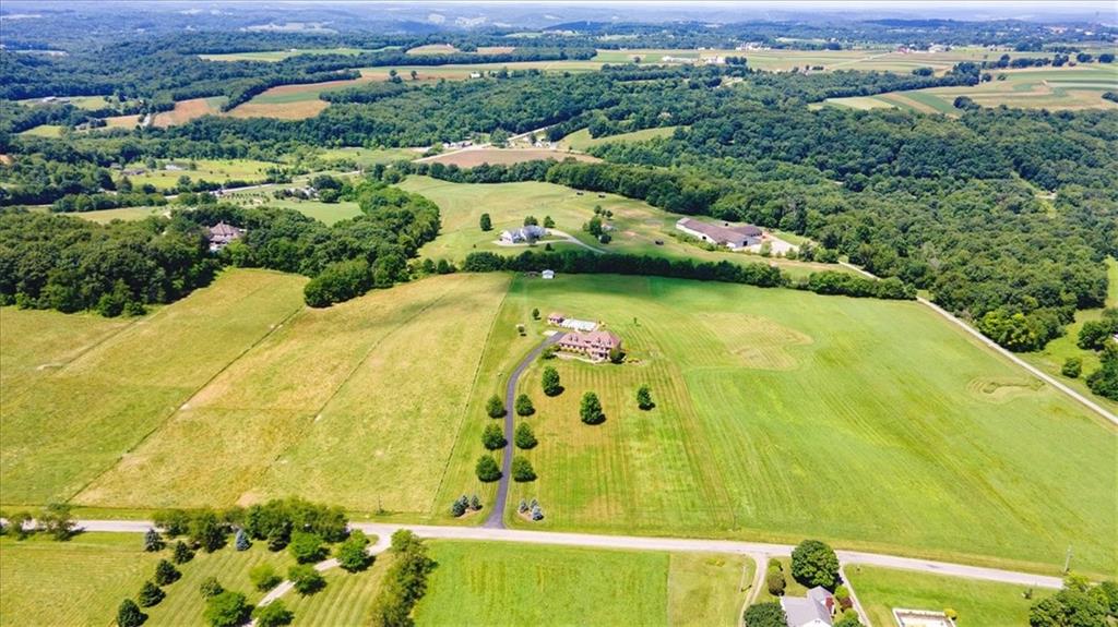 225 Church Road Fombell, PA 16123 - Photo 5 of 45 a view of a swimming pool with a yard