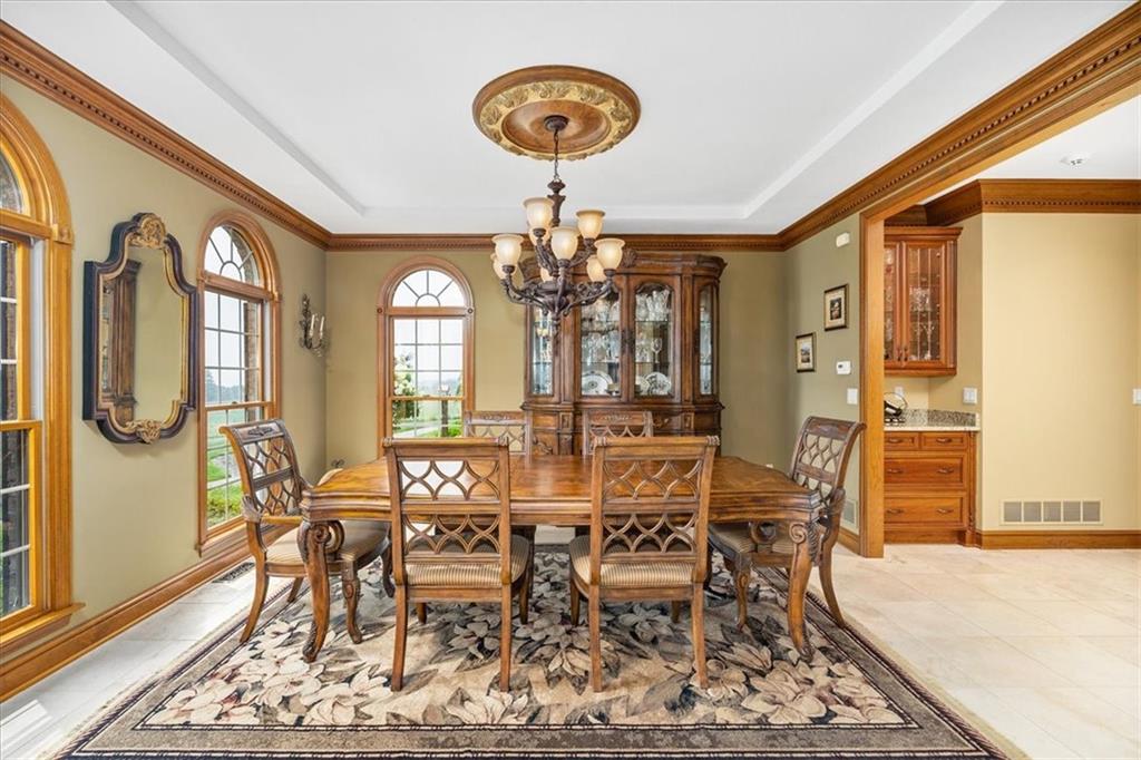 225 Church Road Fombell, PA 16123 - Photo 10 of 45 a view of a dining room with furniture and chandelier