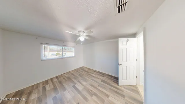a view of empty room with window