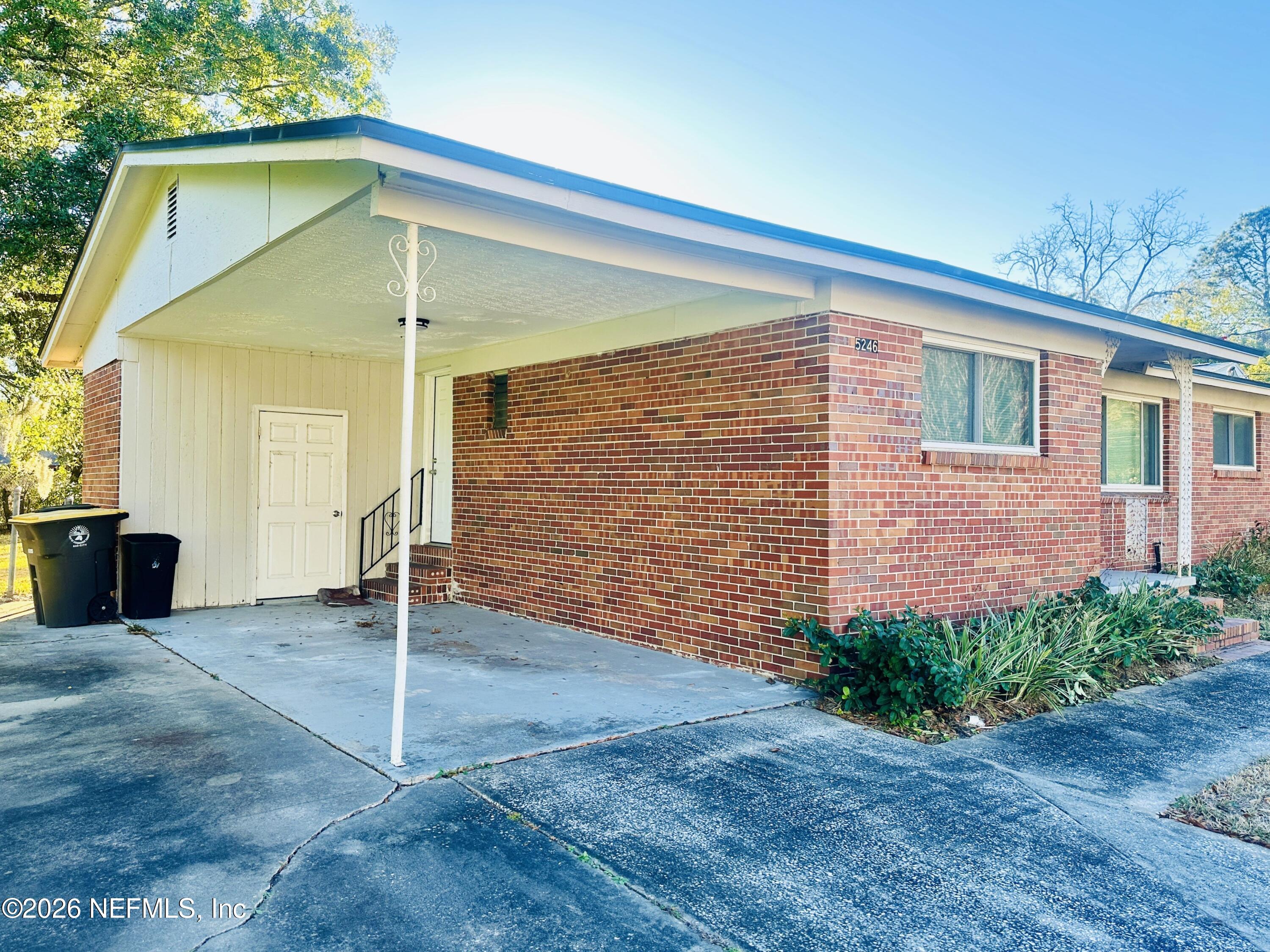 5246 Devron Drive Jacksonville, FL 32209 - Photo 2 of 18 a view of a house with porch