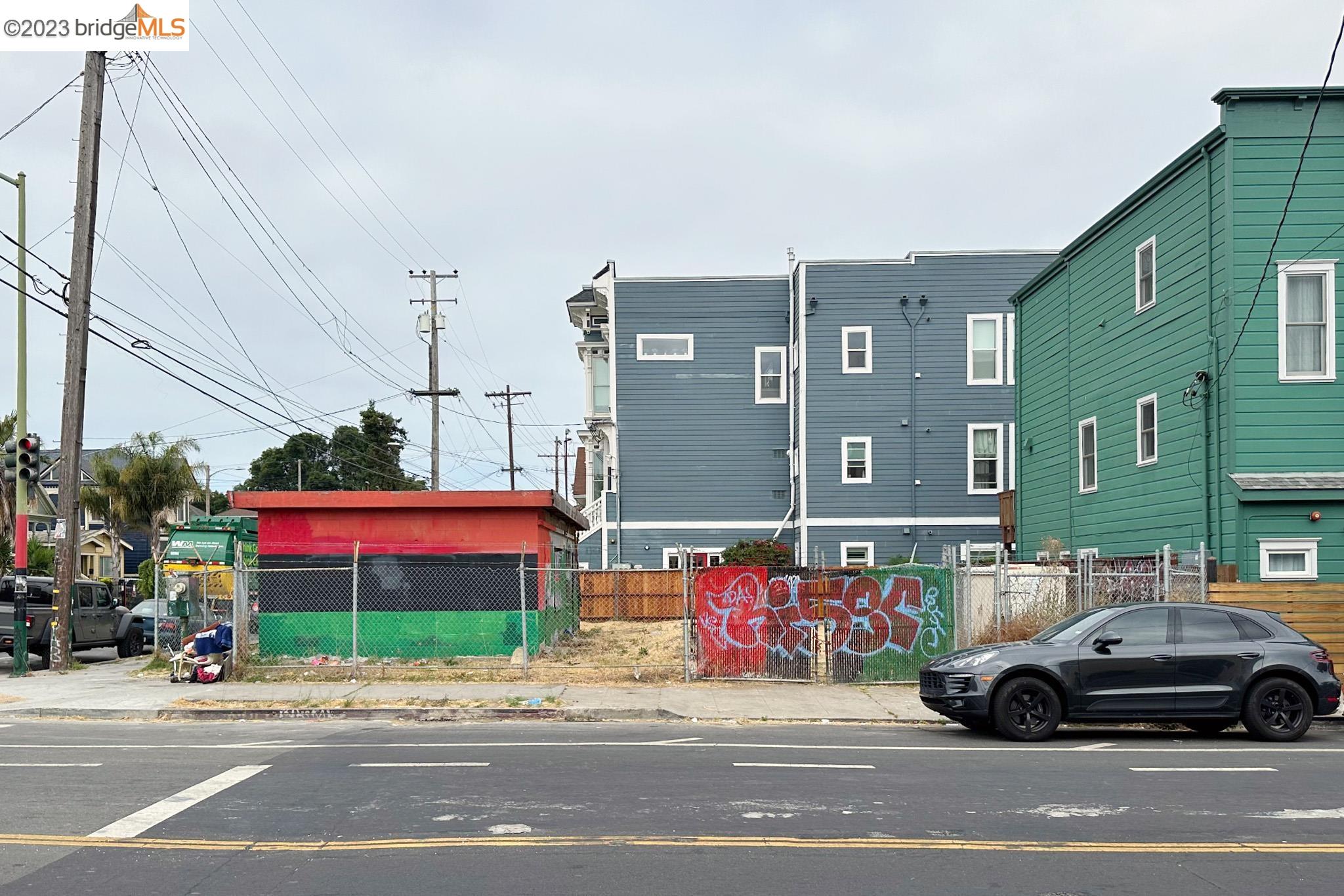 a view of a cars is parked on the side of the road