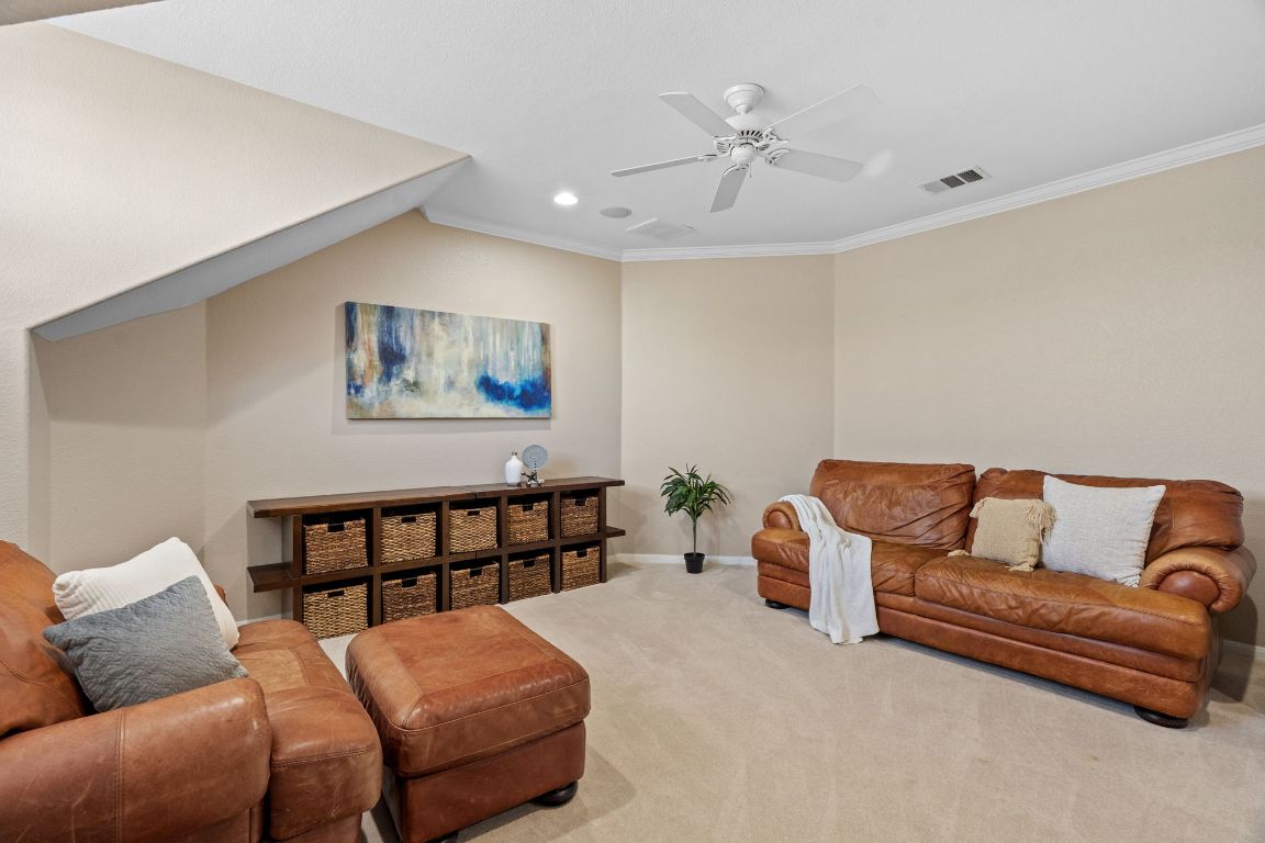 218 Courtnee's Way Georgetown, TX 78626 - Photo 27 of 36 The upstairs flex space offers a true blank canvas, ready to be tailored to your needs - whether it becomes a game room, home theater, fitness area, hobby space, or additional living quarters. Its open layout provides endless possibilities, while natural light and generous square footage make it as functional as it is inviting ~