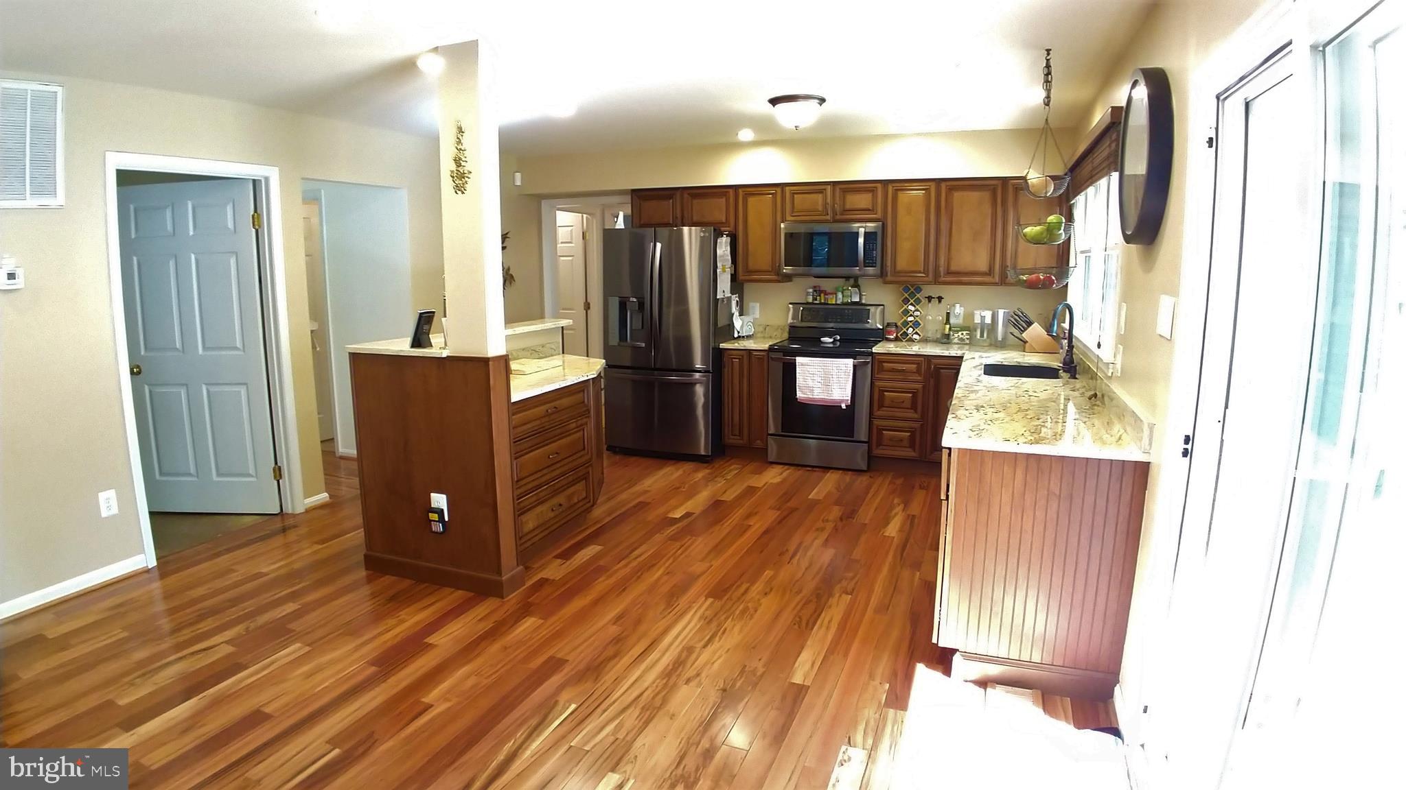 5582 Quiet Brook Road Fairfax, VA 22030 - Photo 14 of 31 Solid wood cabinets with finely detailed doors.
