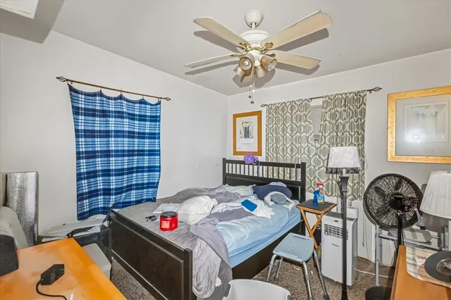 a view of house with outdoor space and garden