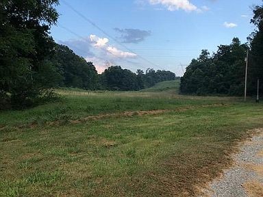 503 Bruce Road Dickson, TN 37055 - Photo 3 of 13 a view of outdoor space with green field and trees
