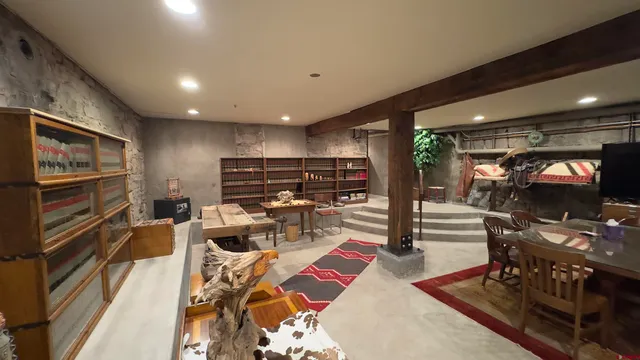 a view of a living room with furniture and a flat screen tv