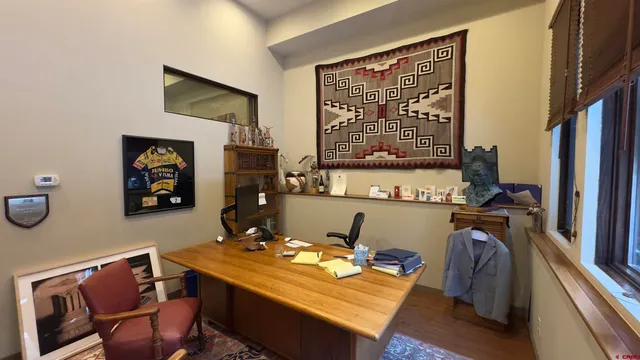 a room with furniture and air hockey table