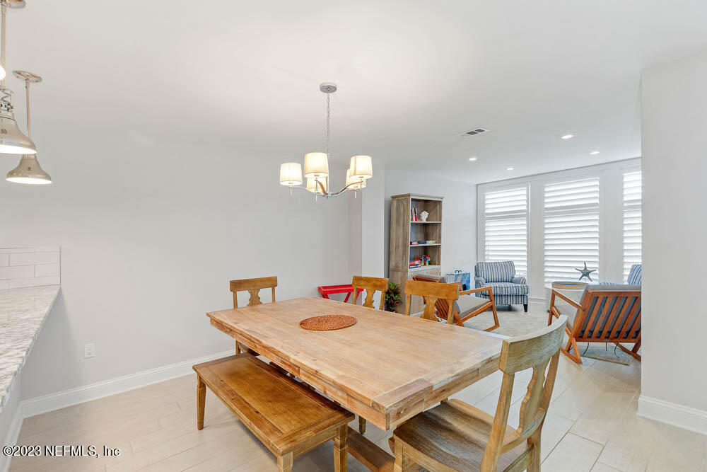 10 Cove Road Ponte Vedra Beach, FL 32082 - Photo 13 of 31 a view of a dining room with furniture window and outside view