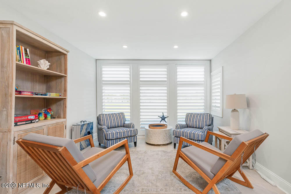 10 Cove Road Ponte Vedra Beach, FL 32082 - Photo 16 of 31 a living room with furniture and a window