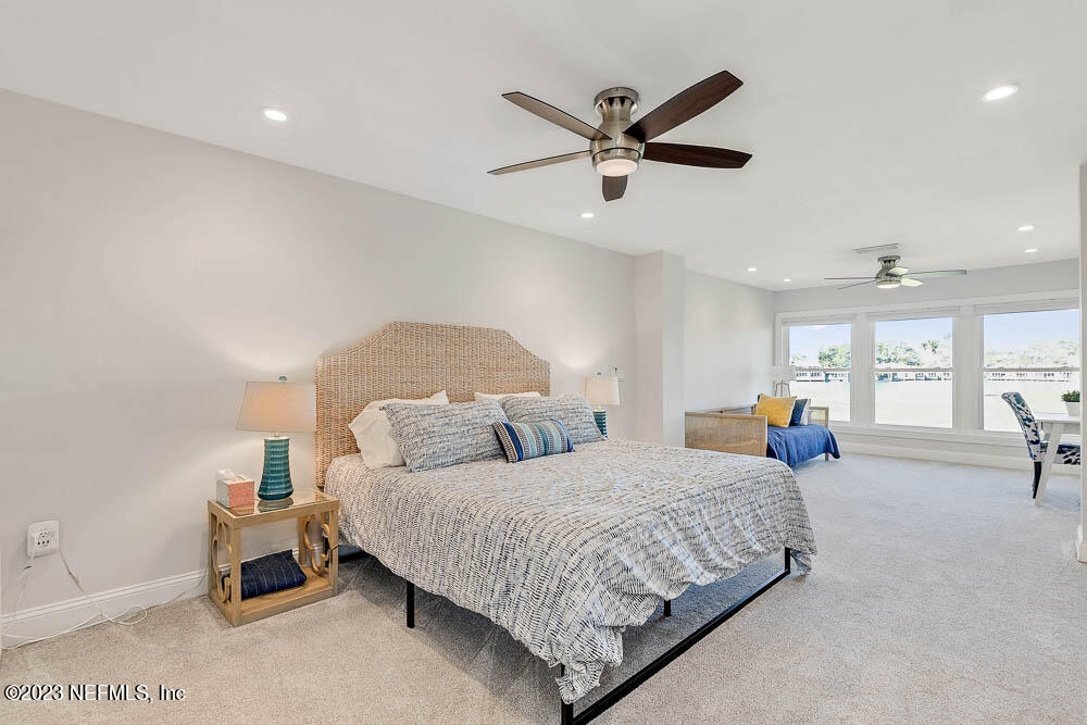 10 Cove Road Ponte Vedra Beach, FL 32082 - Photo 19 of 31 a bedroom with bed and window